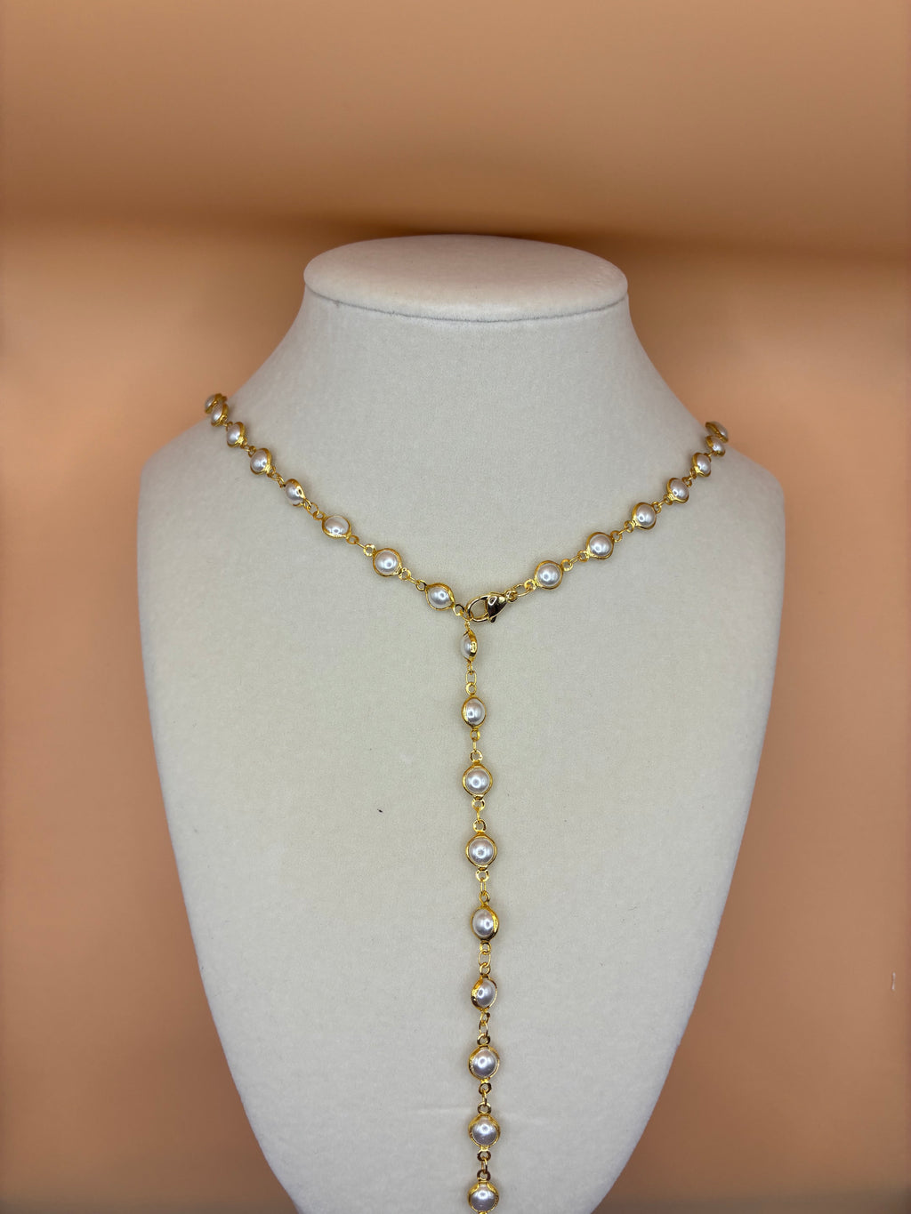 Pearl and gold lariat