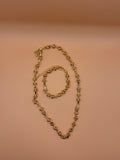 Knott gold necklace and bracelet set