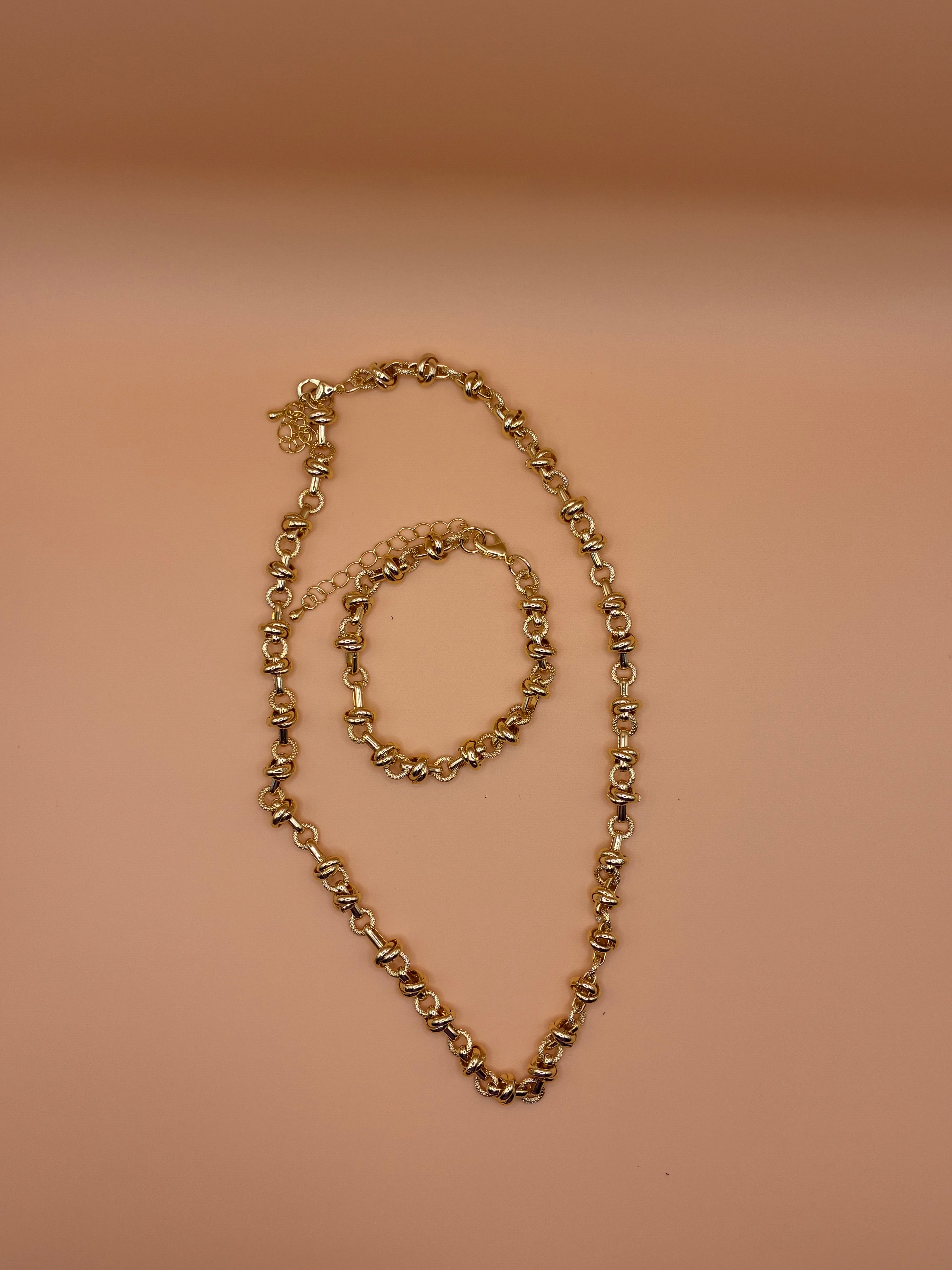Knott gold necklace and bracelet set